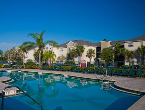 resort style pool with building exteriors in the background