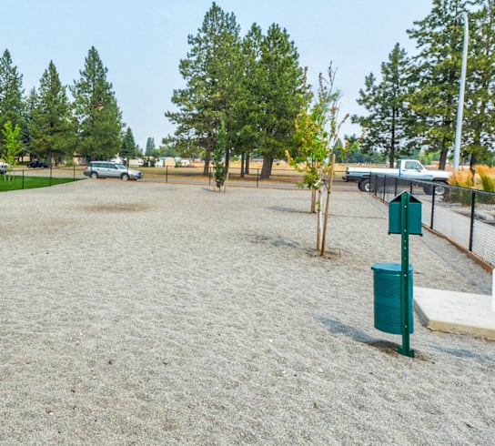 the park has a volleyball court and a picnic bench