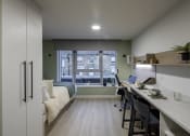 Thumbnail 8 of 8 - a home office with a desk in a room with a bed