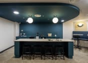 Thumbnail 7 of 8 - a bar with four stools in a room with a blue ceiling and white walls