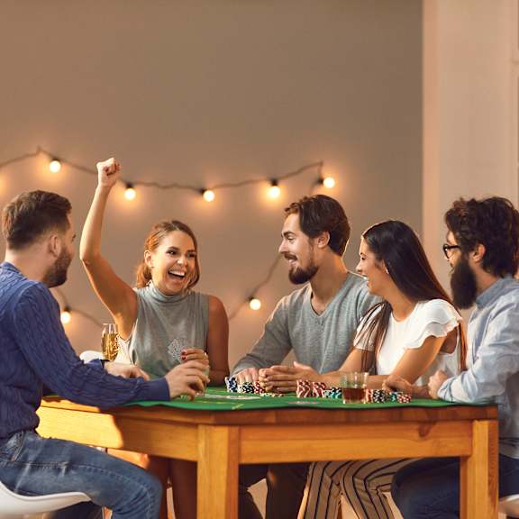 A group of people are playing a board game together.