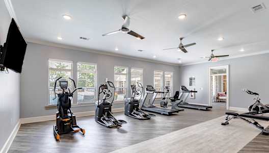 the gym has cardio equipment and treadmills in it