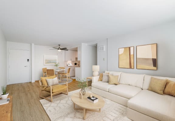 avenue two renovated model apartment furnished living room with couch at Avenue Two Apartments, Redwood City, CA