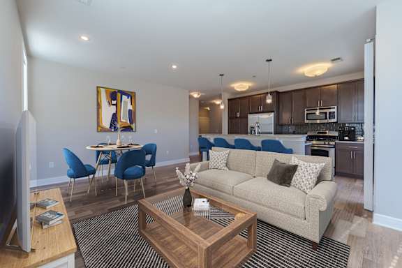 a bedroom with a bed and a ceiling fan