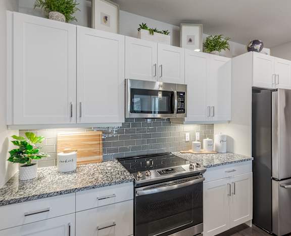 Modern Bathroom with Wood-Style Flooring and Walk-In Closet at Westerly Apartments