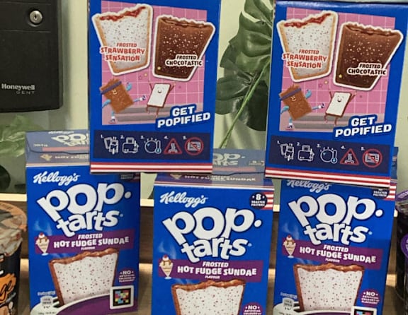 Four boxes of Kellogg's Pop-Tarts are displayed.