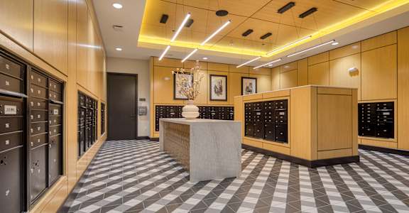 the tasting room of the winery with many wine racks and a granite counter top at Aura Stonebridge, Richmond