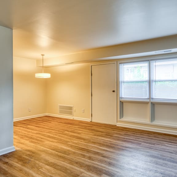 a living room with a couch and a coffee table at Gates of West Bay, Norfolk, VA