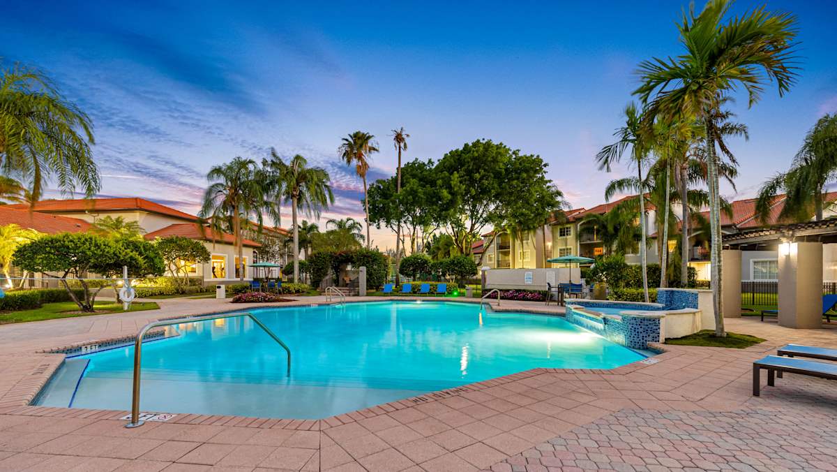 Sunset Gardens swimming pool with palm trees - Miami, FL
