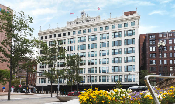 the may company sign on top of a building