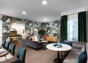 Thumbnail 2 of 19 - a living room filled with furniture and a large window