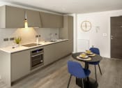 Thumbnail 6 of 12 - a kitchen with a table and chairs and a sink