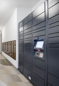 a hallway with lockers and a counter