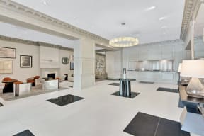a large room with a living room and a kitchen