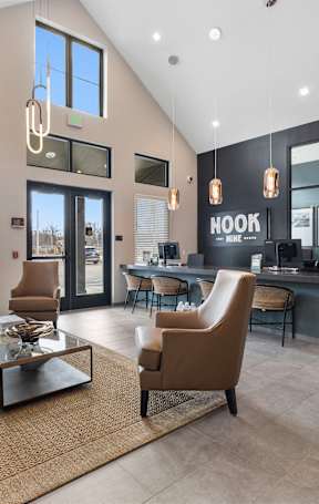 the lobby of a restaurant with a pool table and bar stools at Nook Nine in Indianapolis, IN