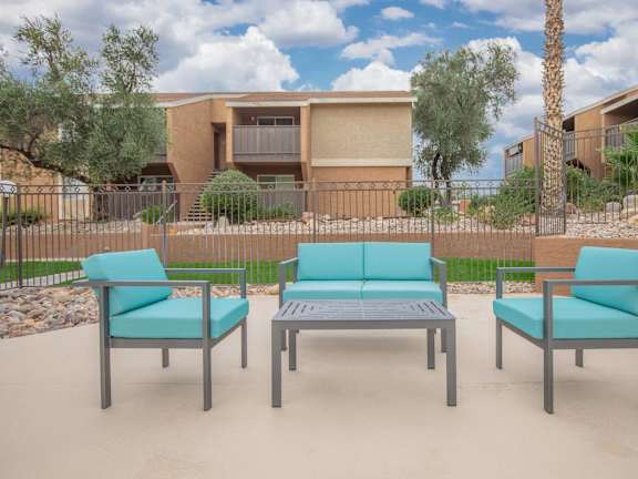 Capistrano Apartments Pool Area Lounge Chairs and Landscaping