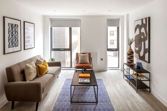a living room with a couch and a coffee table
