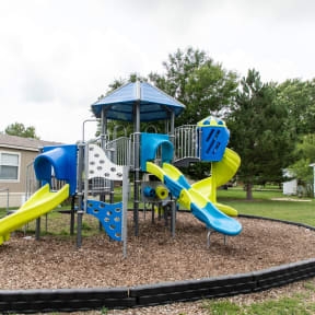 the playground at the whispering winds apartments in pearland, tx