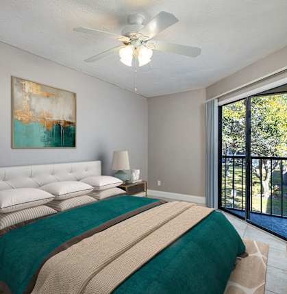 A bedroom with a bed, nightstands, and a painting on the wall.