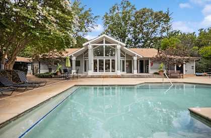 take a dip in the pool at villas at houston levee west apartments in cord at Wendover River Oaks, Greensboro, NC, 27409