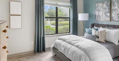 Model bedroom at Mirage on Kernan Apartments in Jacksonville, Florida