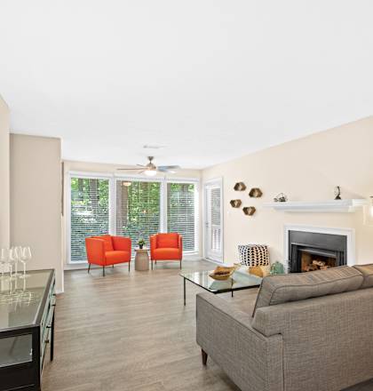 a living room with a couch and a fireplace