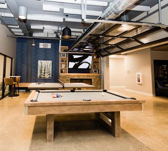 a billiards table in a room with a pool table