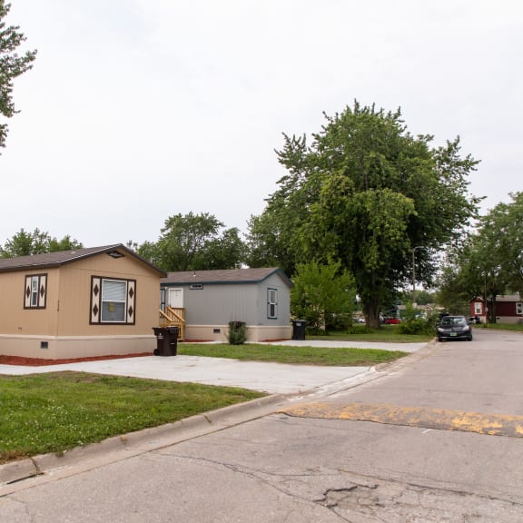 brown and blue mobile home exteriors at Maple Grove in Lincoln, NE