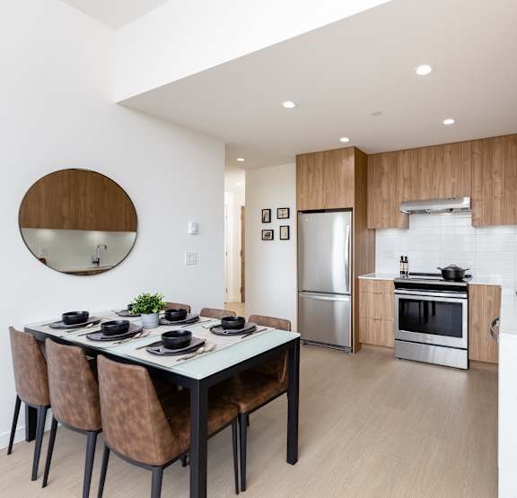 a kitchen with a marble counter top and a sink