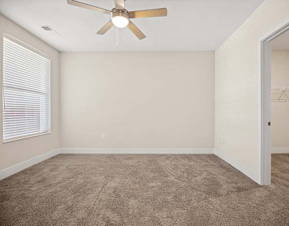 Featured A3 Floor Plan Bedroom designed with walk-in closet at Centro at Pine Nash in Wilson, 27893