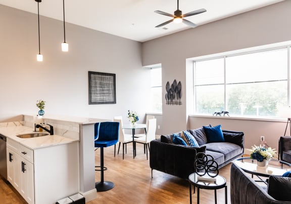 an open floor plan with couches and chairs