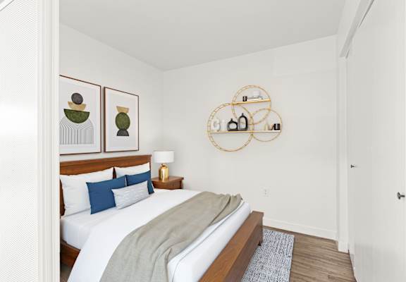 a bedroom with a bed and two night stands