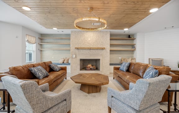 a rendering of a living room and dining room with a table and chairs at Oak Grove at Blake Farm, North Carolina, 28411