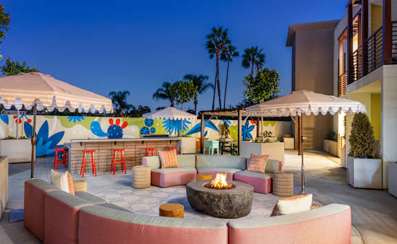 A patio with a fire pit and seating area. at The Reserve La Mirada, California, 90638