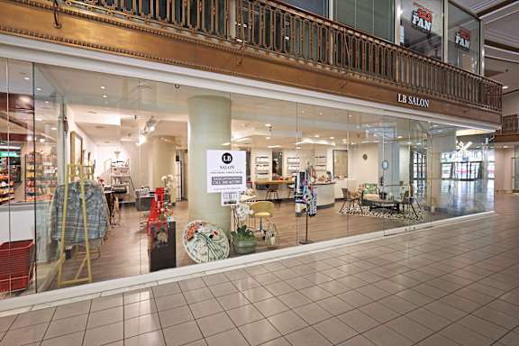 A salon is located in a mall.