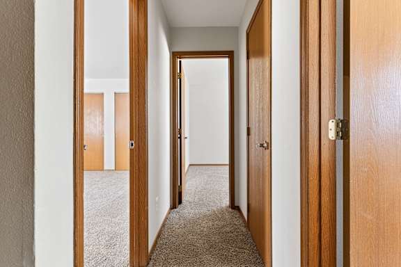 a view of the hallway from the living room to the bedrooms