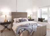 Thumbnail 4 of 4 - a bedroom with a large bed and a window