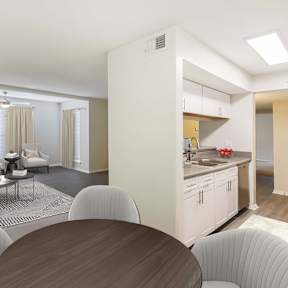 A modern living room with a dining table and chairs.