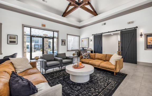 a living room with couches and a coffee table at Marina Point, Chattanooga, 37415