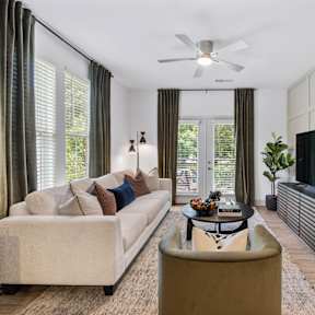 a living room with a couch and a tv