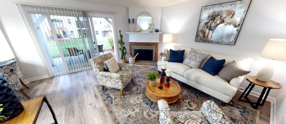 living room at the heights at harper's preserve apartments in conroe, tx