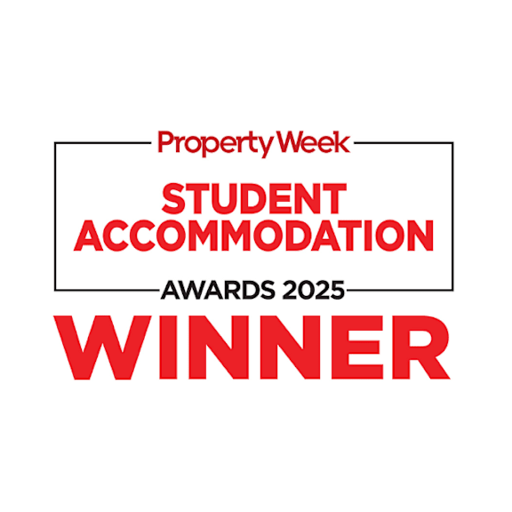 A red and white sign that says Property Week Student Accommodation Awards 2025 Winner.