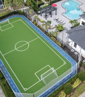 Aerial View of Community Soccer Field with Nets at Rosehill Preserve Apartments in Orlando, FL-SMLAM.