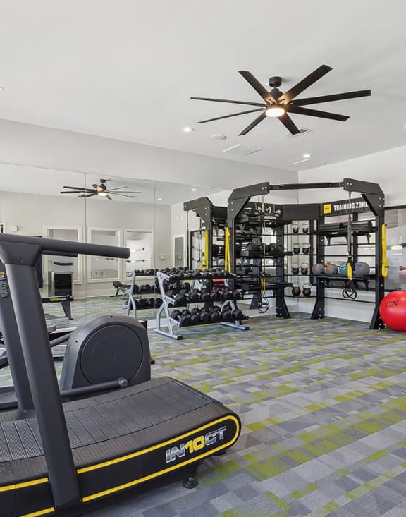 Community Fitness Center with Equipment at Retreat at Stonecrest Apartments located in Lithonia, GA-MEDAM.