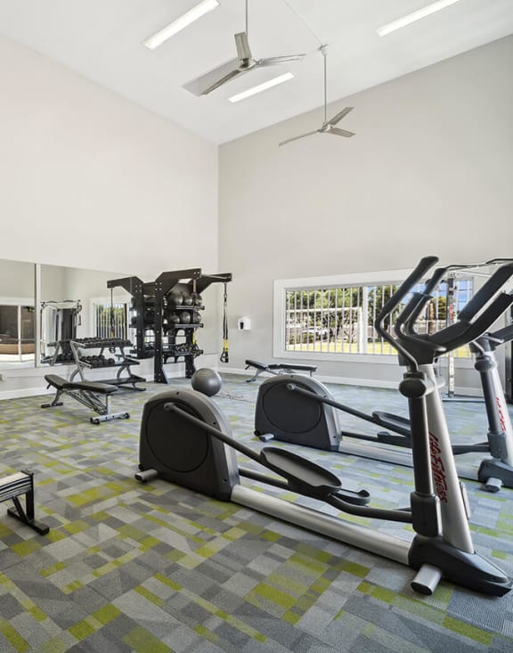 Community Fitness Center with Equipment at Country Club Verandas Apartments located in Mesa, AZ-MEDAM.
