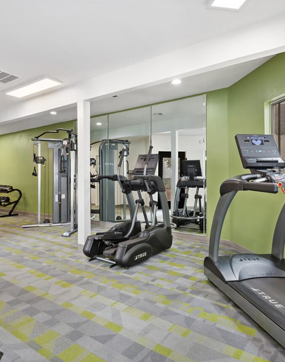 Community Fitness Center with Equipment at Crystal Creek Apartments in Phoenix, AZ-MEDAM.