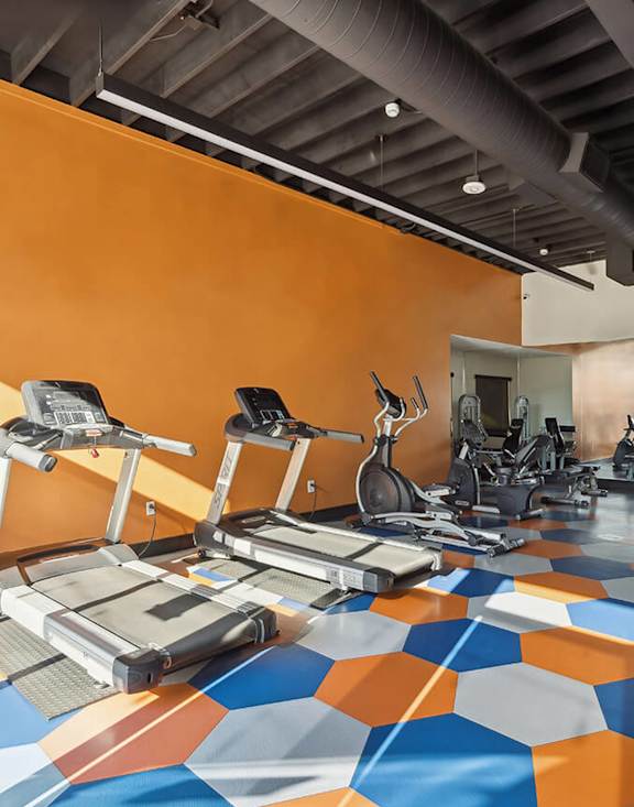 Community Fitness Center with Equipment at Horizon Apartments located in Santa Ana, CA-MEDAM.