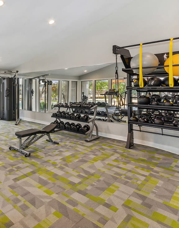 Community Fitness Center with Equipment at Summit Ridge Apartments located in Arlington, TX-MEDAM.