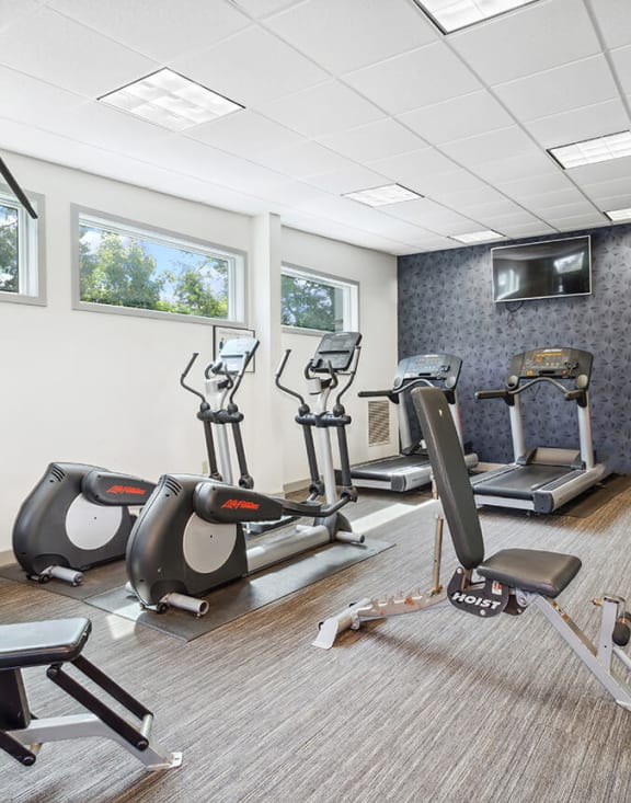 Community Fitness Center with Equipment at Village at Marshfield Apartments located in Marshfield, MA-MEDAM.
