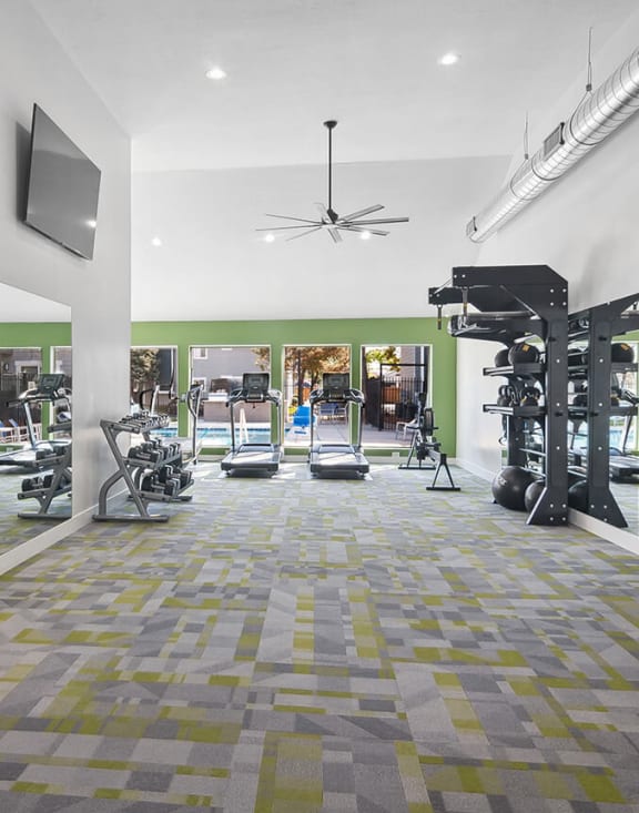 Community Fitness Center with Equipment at Overlook Point Apartments in Salt Lake City, UT-MEDAM.